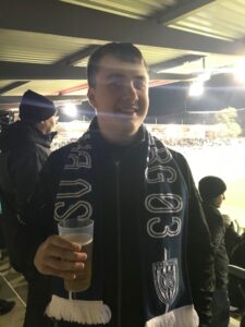 Jack enjoying his new Babelsberg scarf and a beer!